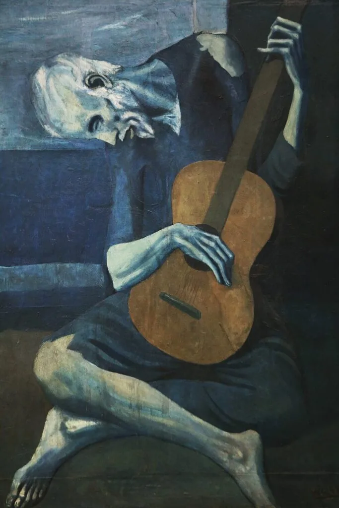 The Old Guitarist Painting by Picasso. 1903. 