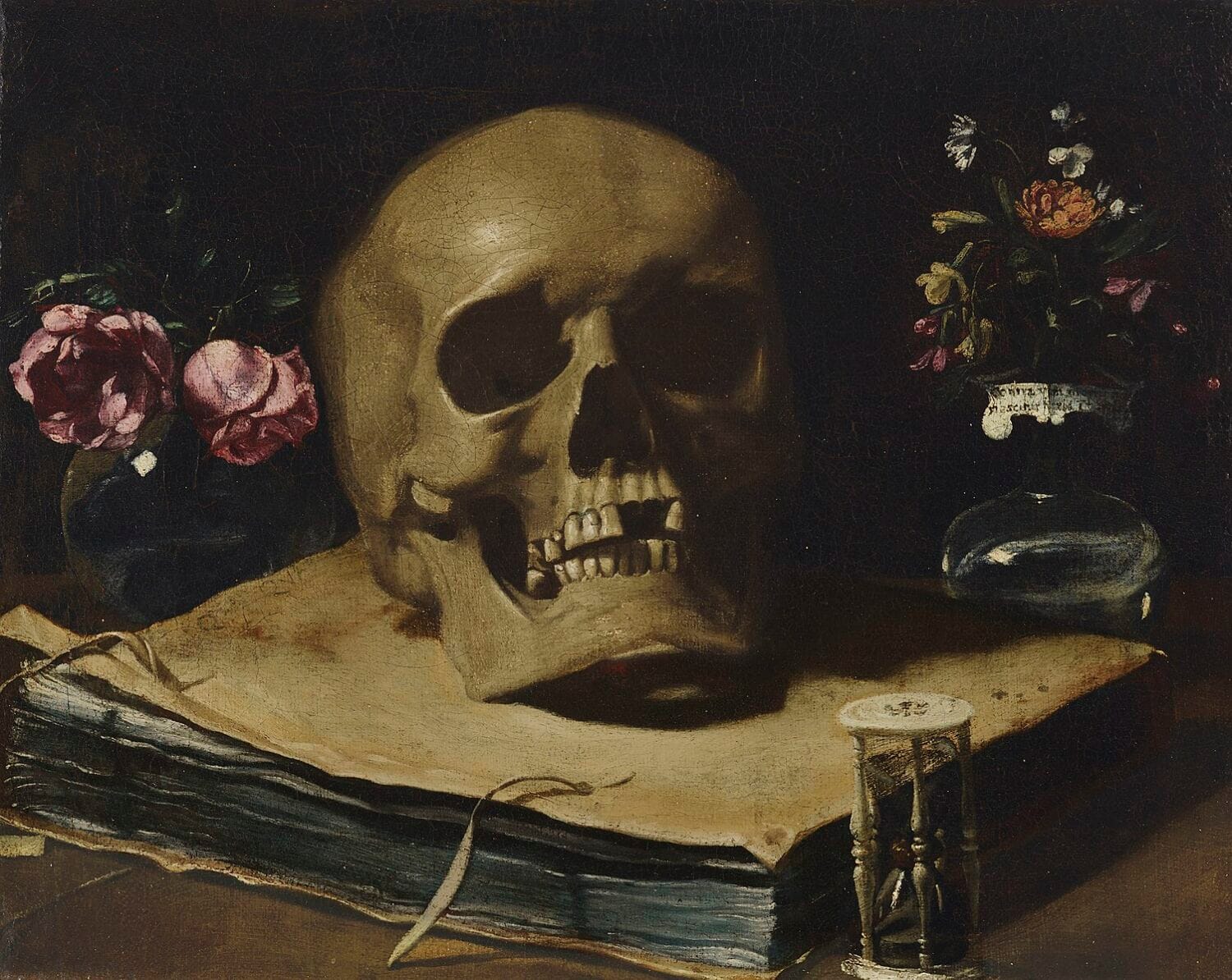 A vanitas still life with a skull atop a book, an hourglass and two glass vases of flowers by Guercino. 1619-1620.